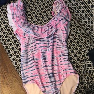 Ruffle around one piece. NWOT. Medium.